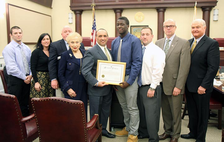 The Monmouth County Board of Chosen Freeholders presented Tyree Sutton, a senior at Keansburg High School, with a certificate of recognition in honor of winning a NJSIAA Wrestling Championships title at their regular meeting on March 12. 
